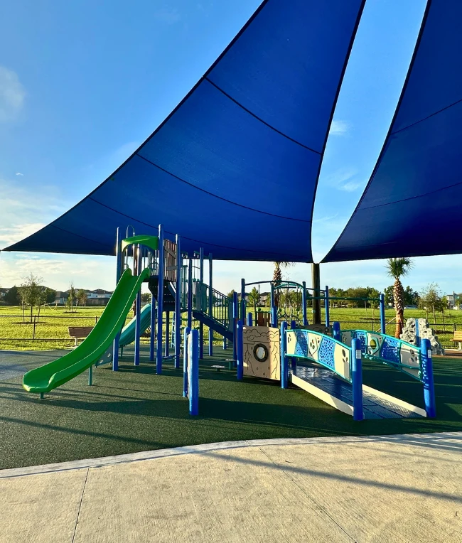 Shaded playground at Watermark Park in Horizon West